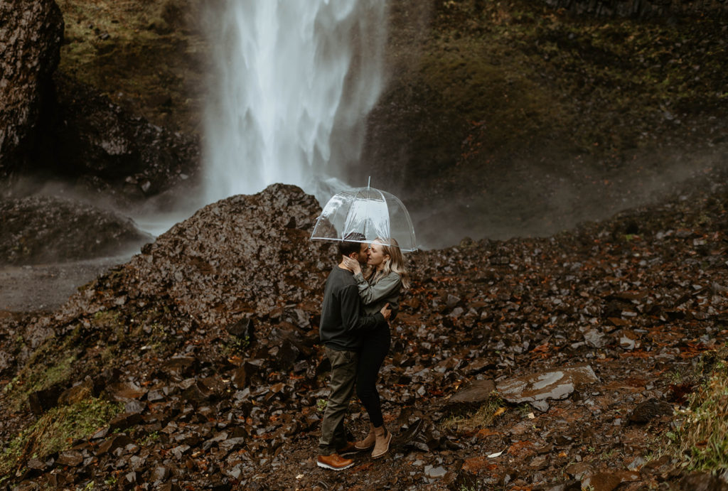 Engagement photos under waterfall in Oregon