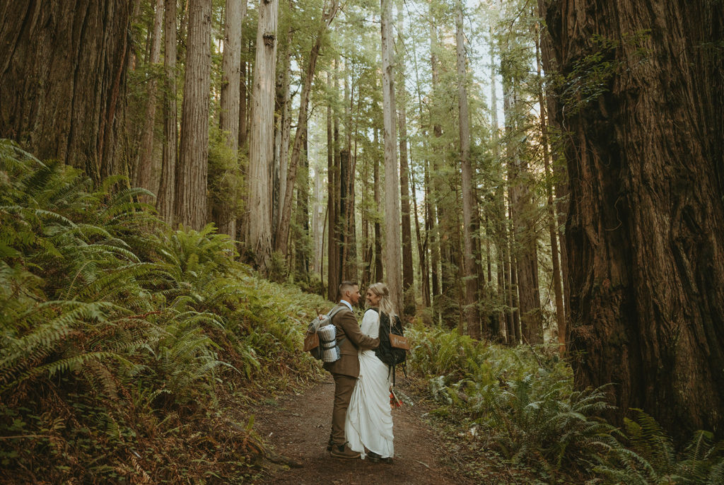Oregon elopement photos hiking with backpacks