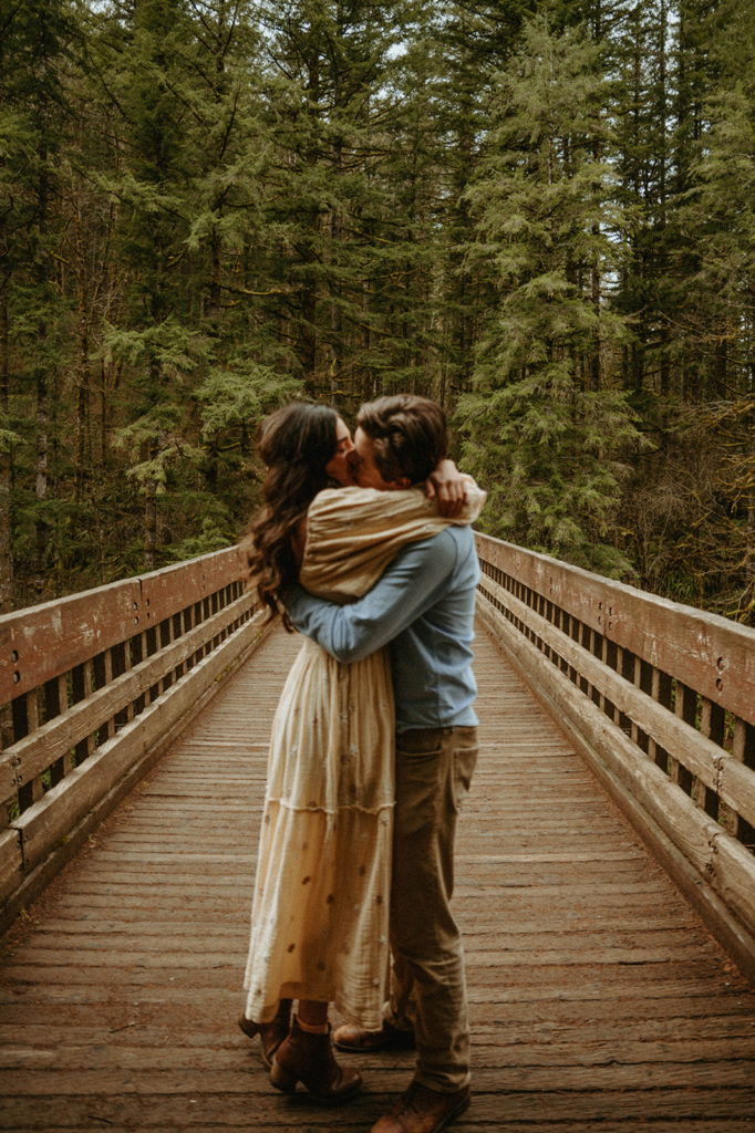 engaged couple in the redwoods