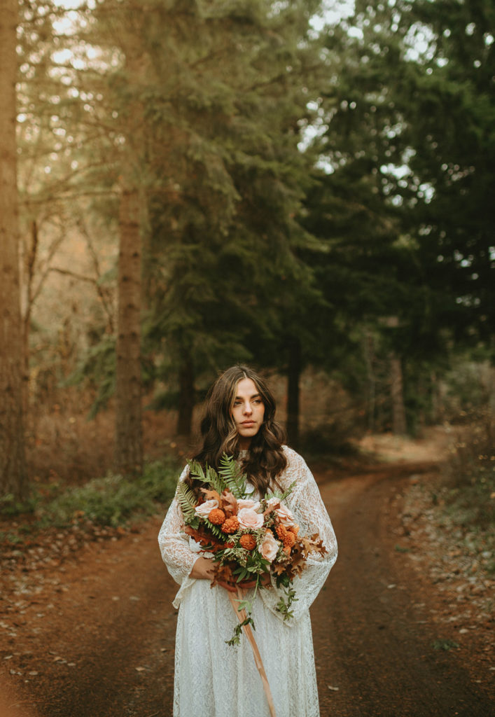 Elopement bride with large boho flower bouquet