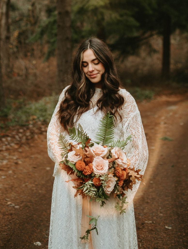 Boho bride with bouquet. Florist for Oregon Elopements