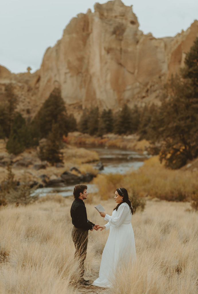 Smith Rock Wedding Elopement photos. Bride and groom saying vows