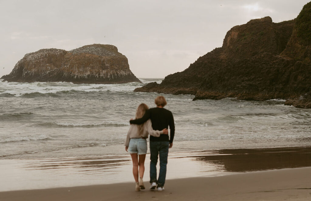 Callie and Nolan looking out at the ocean standing together