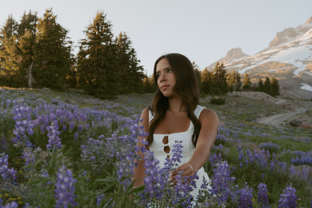 High school senior portrait in purple wildflower field at Mount Hood