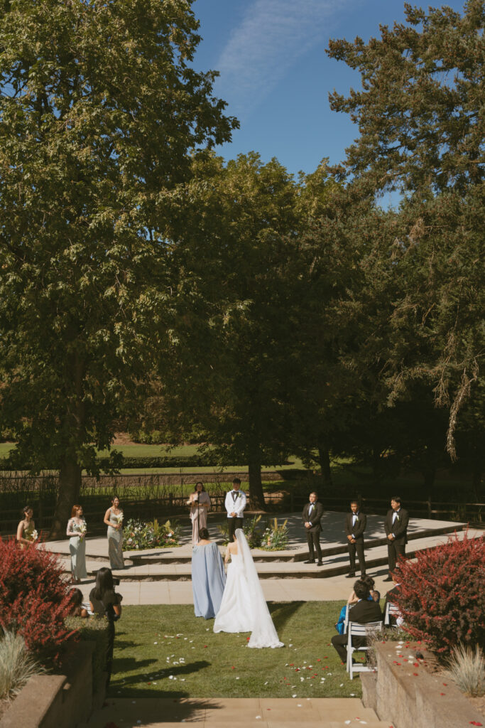 Aerial view of outdoor vineyard wedding ceremony
