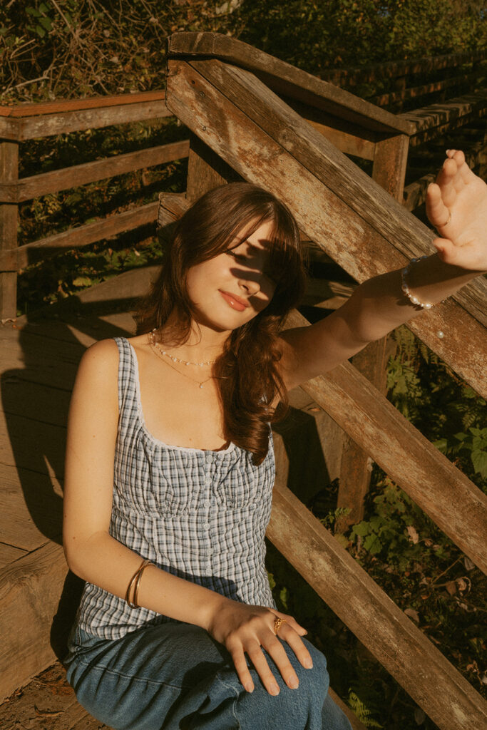 Woman covering her eyes from the sun