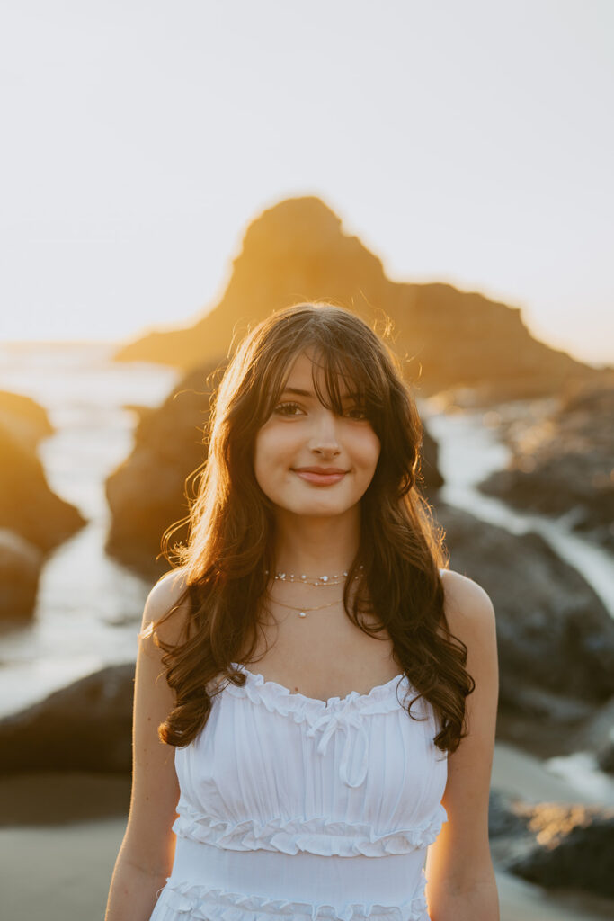 Golden hour portrait of a woman wearing white dress