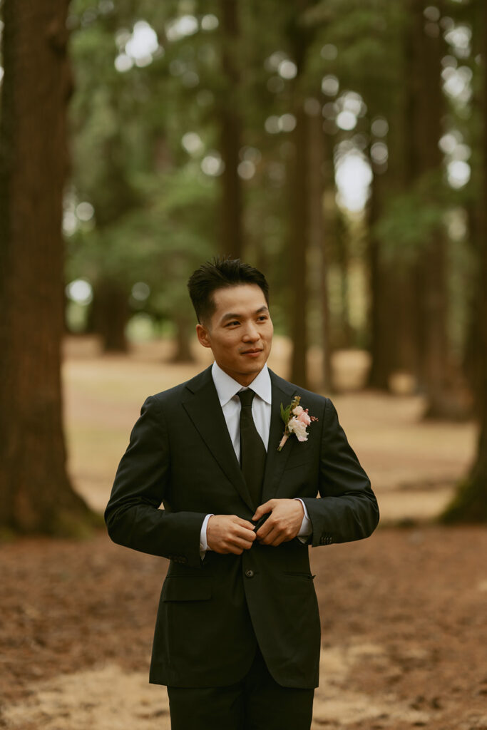 Groom in forest during Portland Oregon elopement