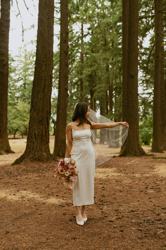 Bride holding bouquet in the fores