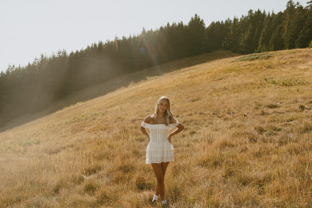 Salem Oregon senior photography portrait in meadow at sunset