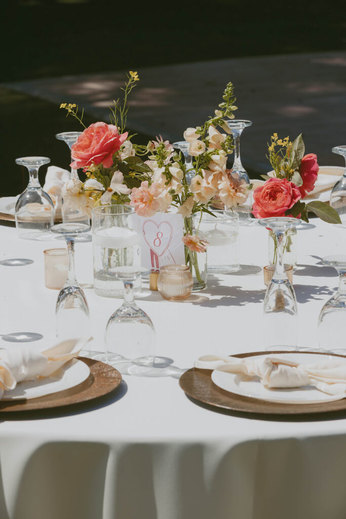 Outdoor table with colorful floral centerpiece